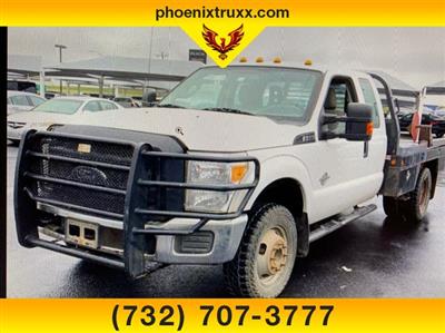 Used 2014 Ford F-350 XLT Super Cab 4x4, DewEze Parallel Squeeze Flatbed Truck for sale #13743 - photo 1