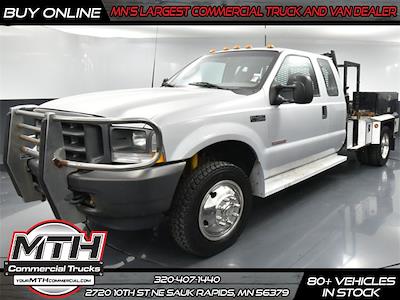 Used 2003 Ford F-450 XLT Super Cab 4x4, Flatbed Truck for sale #CA00180 - photo 1