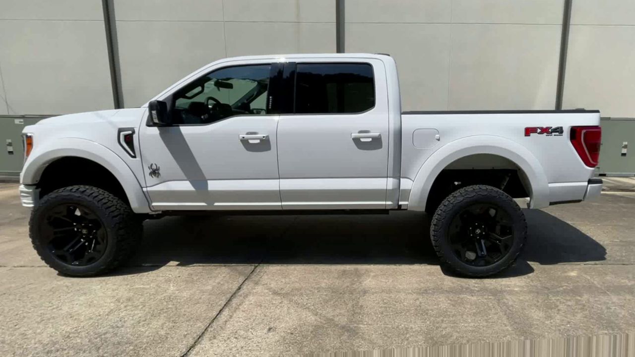 lifted pickup truck side view