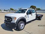 Used 2022 Ford F-550 Crew Cab 4WD, Flatbed Truck for sale #50539 - photo 1