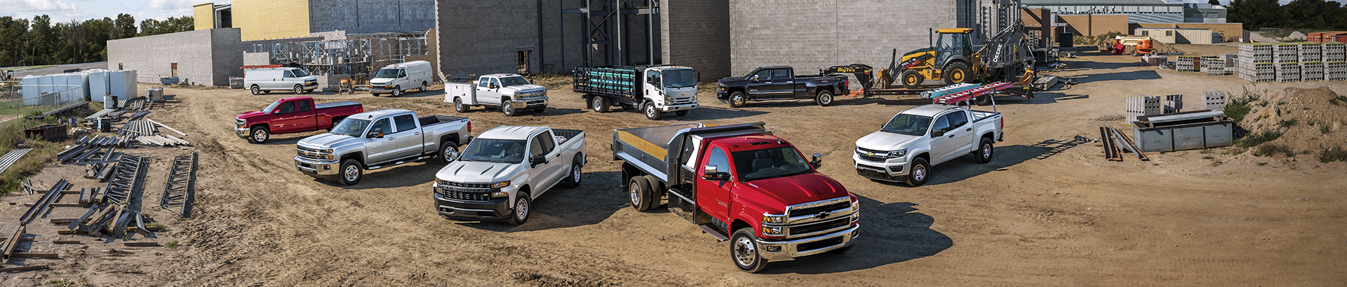 Chevrolet work vehicle lineup at construction site in North Carolina