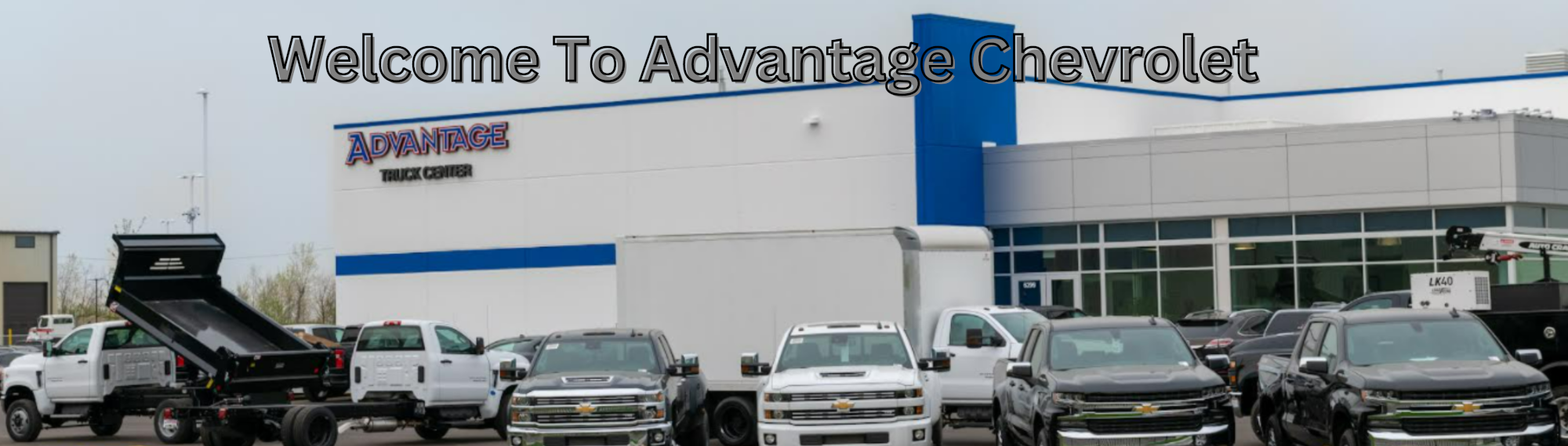 Welcome To Advantage Chevrolet overlayed on the dealership facade